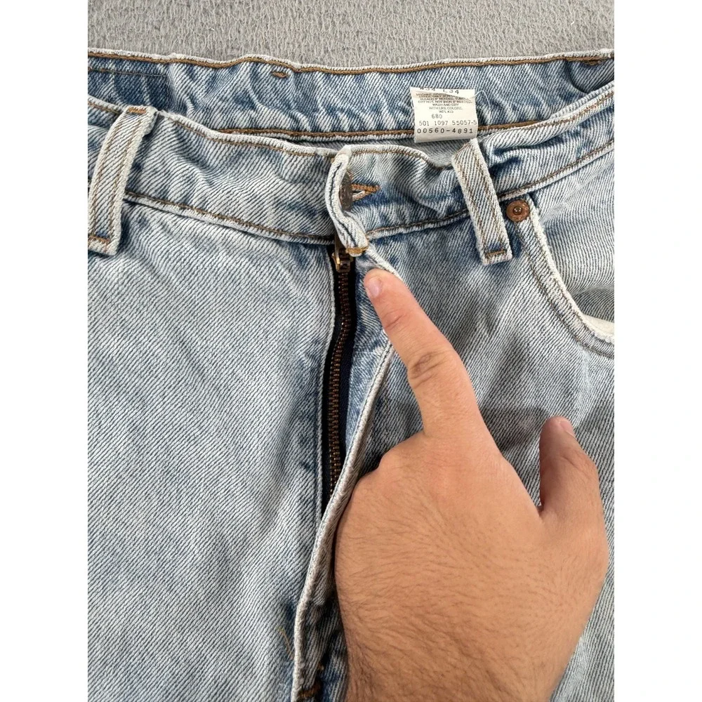 Vintage Levi's 560 Loose Fit Straight Leg Jeans Men 32x33 Distressed Grunge 1997